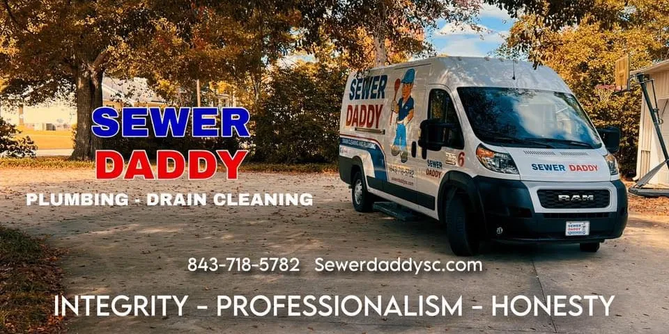 A Sewer Daddy technician working on a plumbing repair.