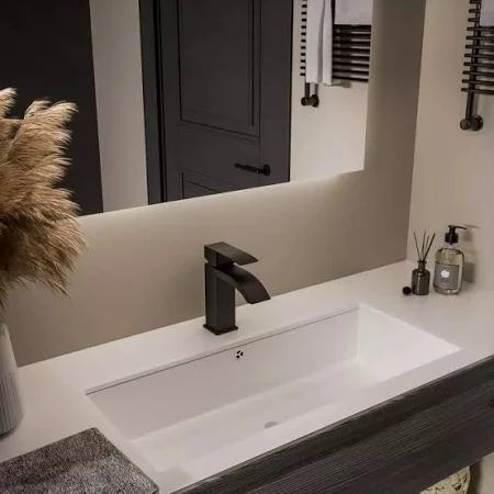 A variety of stylish, modern bathroom and kitchen faucets and sinks.