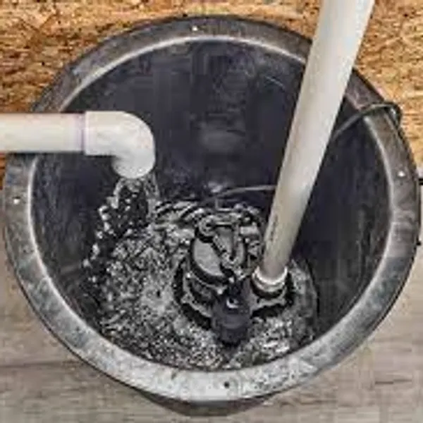 A professionally installed sump pump in a clean sump pit.